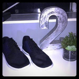 Purple and black trainers